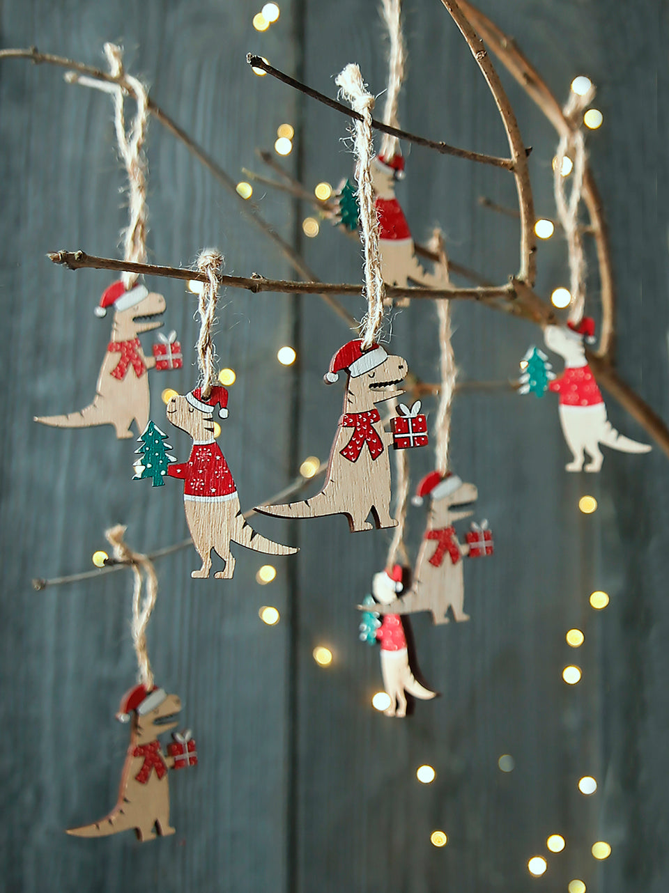 Juego de dinosaurios navideños de madera